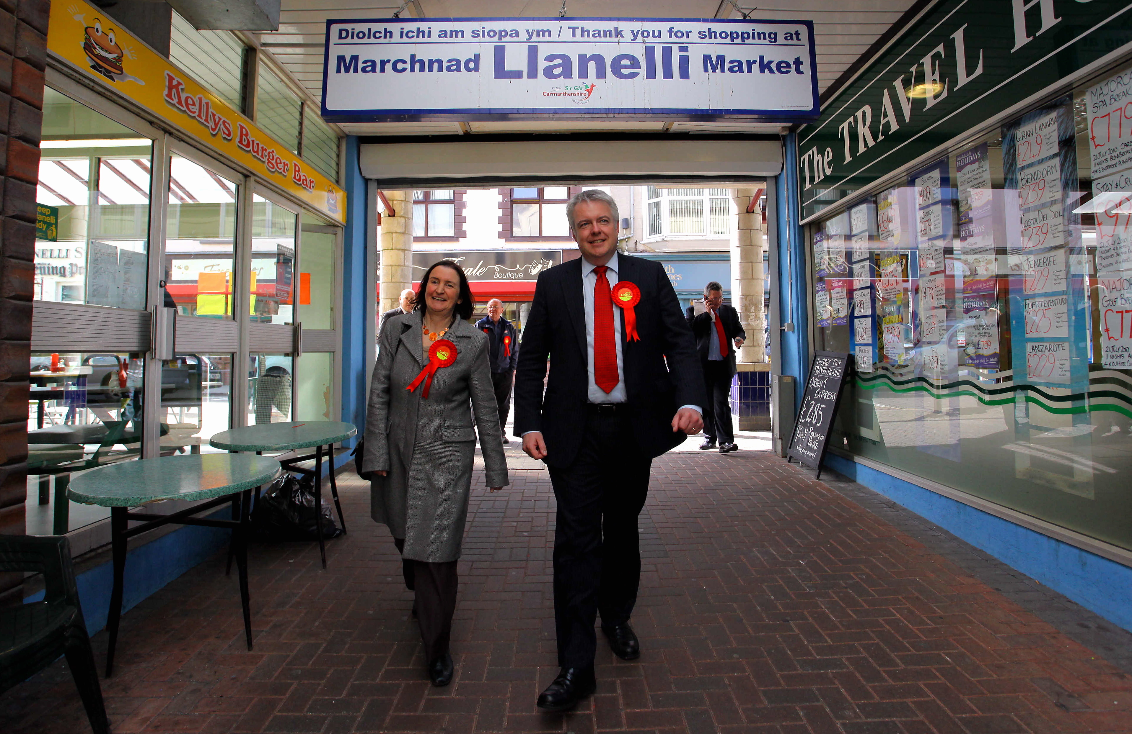 Pictured: Nia Griffiths and Carwyn Jones in Llanelli Market Re: Nia Griffiths MP canvassing shoppers for Labour's pre election campaign, in the town centre of her constituency of Llanelli in Carmarthenshire west Wales, with First Minister for Wales Carwyn Jones. Thursday 08 April 2010