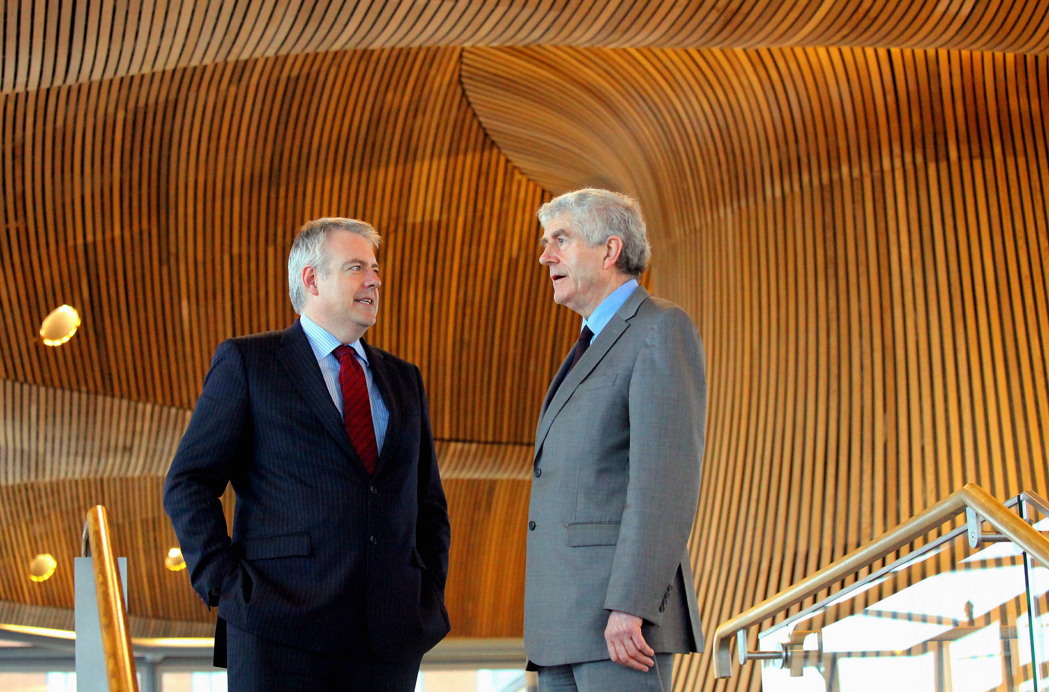 Rhodri Morgan (R) with successor Carwyn Jones (L) in the Senedd Cardiff Bay. Last day in office for First Minister for Wales Rhodri Morgan at the Welsh Assembly Government where he took part in First Minister Questions at the Chambers in the Senedd at Cardiff Bay for the last time, to be succeeded by Carwyn Jones Assembly Member for Bridgend.